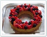 Tarte Design Amandes et fruits rouges pate sablée, crème amandine, et trois sortes de fruits rouges